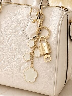 Authentic Louis Vuitton Lock & Key with Unbranded Flower Charm, Keychain